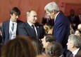 Vladimir Putin, John Kerry © Ansa
